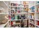 Walk-in pantry with custom shelving, offering ample storage for all your kitchen essentials at 114 Karland Nw Dr, Atlanta, GA 30305