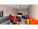 View of a bedroom with neutral colored walls and carpet, a ceiling fan, and minimal furnishings at 185 Wyngate Ct, Dallas, GA 30157