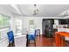 Eat-in kitchen features modern lighting and stainless steel refrigerator at 185 Wyngate Ct, Dallas, GA 30157