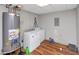 Laundry room with a washer, dryer, and water heater at 185 Wyngate Ct, Dallas, GA 30157