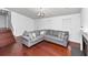 Open concept living room featuring hardwood floors, lots of natural light and a staircase at 185 Wyngate Ct, Dallas, GA 30157