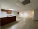 Finished basement with tile flooring, wet bar, and recessed lighting for a modern look at 1935 Lamp Post Ln, Lawrenceville, GA 30043