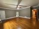 Large bedroom area offering wood floors, generous space, and plenty of natural light at 1935 Lamp Post Ln, Lawrenceville, GA 30043