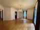 Refined dining area featuring chandelier and hardwood floors at 1935 Lamp Post Ln, Lawrenceville, GA 30043