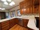 Cozy kitchen features updated appliances, hardwood floors, and eat-in breakfast area at 1935 Lamp Post Ln, Lawrenceville, GA 30043