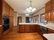 Functional kitchen boasts ample storage with custom cabinetry and center island at 1935 Lamp Post Ln, Lawrenceville, GA 30043