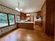 Traditional kitchen with updated appliances and hardwood floors and cabinetry at 1935 Lamp Post Ln, Lawrenceville, GA 30043