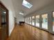 Well lit sun room featuring skylights, a billiard table, and access to an outdoor deck at 1935 Lamp Post Ln, Lawrenceville, GA 30043