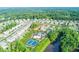 Beautiful Primary-planned community with manicured lawns, sidewalks, and mature trees at 225 Sundance Dr, Woodstock, GA 30188
