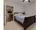 Bedroom leading to finished basement with pool table and seating area through open doorway at 225 Sundance Dr, Woodstock, GA 30188