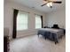 Bright bedroom with ample natural light, a ceiling fan and neutral decor at 225 Sundance Dr, Woodstock, GA 30188