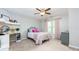 Bright bedroom with a comfortable bed, desk area, and a soft color palette at 225 Sundance Dr, Woodstock, GA 30188