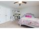 Bright bedroom with a cozy bed, ample storage, and a dedicated study nook, creating a comfortable retreat at 225 Sundance Dr, Woodstock, GA 30188