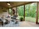 Comfortable seating and a ceiling fan on the covered patio makes for pleasant outdoor experience at 225 Sundance Dr, Woodstock, GA 30188