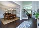 Open floor plan showing dining room and stairs to the second floor at 225 Sundance Dr, Woodstock, GA 30188