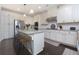 Well-equipped kitchen featuring granite countertops, stainless appliances, and ample storage at 225 Sundance Dr, Woodstock, GA 30188
