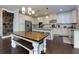 Bright, updated kitchen with an island and dining table, offering modern amenities at 225 Sundance Dr, Woodstock, GA 30188