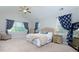 Serene main bedroom featuring vaulted ceiling, plush carpet, and calming decor at 225 Sundance Dr, Woodstock, GA 30188