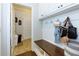 Mud room with bench and overhead storage at 225 Sundance Dr, Woodstock, GA 30188