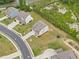 Aerial view of a landscaped property in a suburban neighborhood at 2889 Windsor Knoll Dr, Dacula, GA 30019