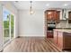 Kitchen with stainless steel appliances and access to the back deck at 2889 Windsor Knoll Dr, Dacula, GA 30019