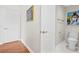 Bathroom featuring a toilet, linen closet, a towel rack, and light gray walls at 3475 Oak Valley Ne Rd # 950, Atlanta, GA 30326