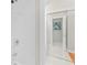 Bathroom featuring white tiled walls and floors and glass-enclosed shower with silver hardware at 3475 Oak Valley Ne Rd # 950, Atlanta, GA 30326
