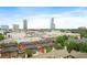 An elevated view of the skyline featuring mid-rise buildings, rooftops, and commercial buildings at 3475 Oak Valley Ne Rd # 950, Atlanta, GA 30326