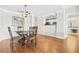 Elegant dining area with hardwood floors and a view into an updated kitchen at 3475 Oak Valley Ne Rd # 950, Atlanta, GA 30326