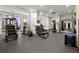 Well-equipped gym featuring modern exercise equipment and large windows for natural light at 3475 Oak Valley Ne Rd # 950, Atlanta, GA 30326