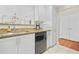 Kitchen with white cabinets, granite counters, stainless dishwasher, and recessed lighting at 3475 Oak Valley Ne Rd # 950, Atlanta, GA 30326