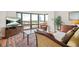 Comfortable living room with large windows boasting city views at 3475 Oak Valley Ne Rd # 950, Atlanta, GA 30326