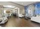 Elegant resident lounge area with wood floors, plush seating, and stylish decor at 3475 Oak Valley Ne Rd # 950, Atlanta, GA 30326