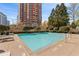 Outdoor swimming pool with clear water and a well-maintained deck at 3475 Oak Valley Ne Rd # 950, Atlanta, GA 30326