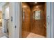 Interior view of residential elevator with wooden paneling and tile flooring at 2295 Falmouth Se Ct, Smyrna, GA 30080