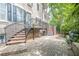 Inviting townhome entrance with well-maintained landscaping at 2295 Falmouth Se Ct, Smyrna, GA 30080