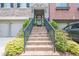 Attractive brick townhome entrance with manicured landscaping at 2295 Falmouth Se Ct, Smyrna, GA 30080