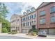 Attractive brick townhome with a two-car garage and well-maintained landscaping at 2295 Falmouth Se Ct, Smyrna, GA 30080