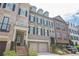 Charming brick townhomes featuring attached garages at 2295 Falmouth Se Ct, Smyrna, GA 30080