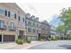 Attractive brick townhomes featuring attached garages at 2295 Falmouth Se Ct, Smyrna, GA 30080