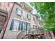 Brick townhome featuring a cozy balcony with outdoor seating at 2295 Falmouth Se Ct, Smyrna, GA 30080