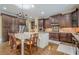 A stunning kitchen boasts a large island with granite counters and professional grade appliances at 2295 Falmouth Se Ct, Smyrna, GA 30080