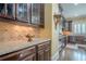 Gourmet kitchen features granite countertops, custom cabinets, and stainless steel appliances at 2295 Falmouth Se Ct, Smyrna, GA 30080