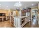 Open concept kitchen with a large center island that provides dining and cooking space at 2295 Falmouth Se Ct, Smyrna, GA 30080