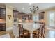 A beautiful kitchen showcases granite counters, stainless appliances, and a center island with seating at 2295 Falmouth Se Ct, Smyrna, GA 30080