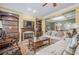 Inviting living room featuring a fireplace, custom built-ins, and comfortable seating at 2295 Falmouth Se Ct, Smyrna, GA 30080