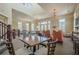 Expansive lounge area with comfortable seating, a staircase to upper level, and a TV viewing area at 2295 Falmouth Se Ct, Smyrna, GA 30080