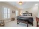 Main bedroom featuring two windows, bench, and neutral paint at 2295 Falmouth Se Ct, Smyrna, GA 30080