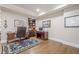 Inviting home office featuring custom built-ins, hardwood floors, and lots of natural light at 2295 Falmouth Se Ct, Smyrna, GA 30080