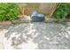 Paver patio with brick walls, landscaping, and built-in grill at 2295 Falmouth Se Ct, Smyrna, GA 30080